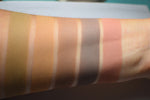 Skin swatches on medium skin tone caucasian inner arm. Natural warm tones of browns. Gullveig is first on the left.