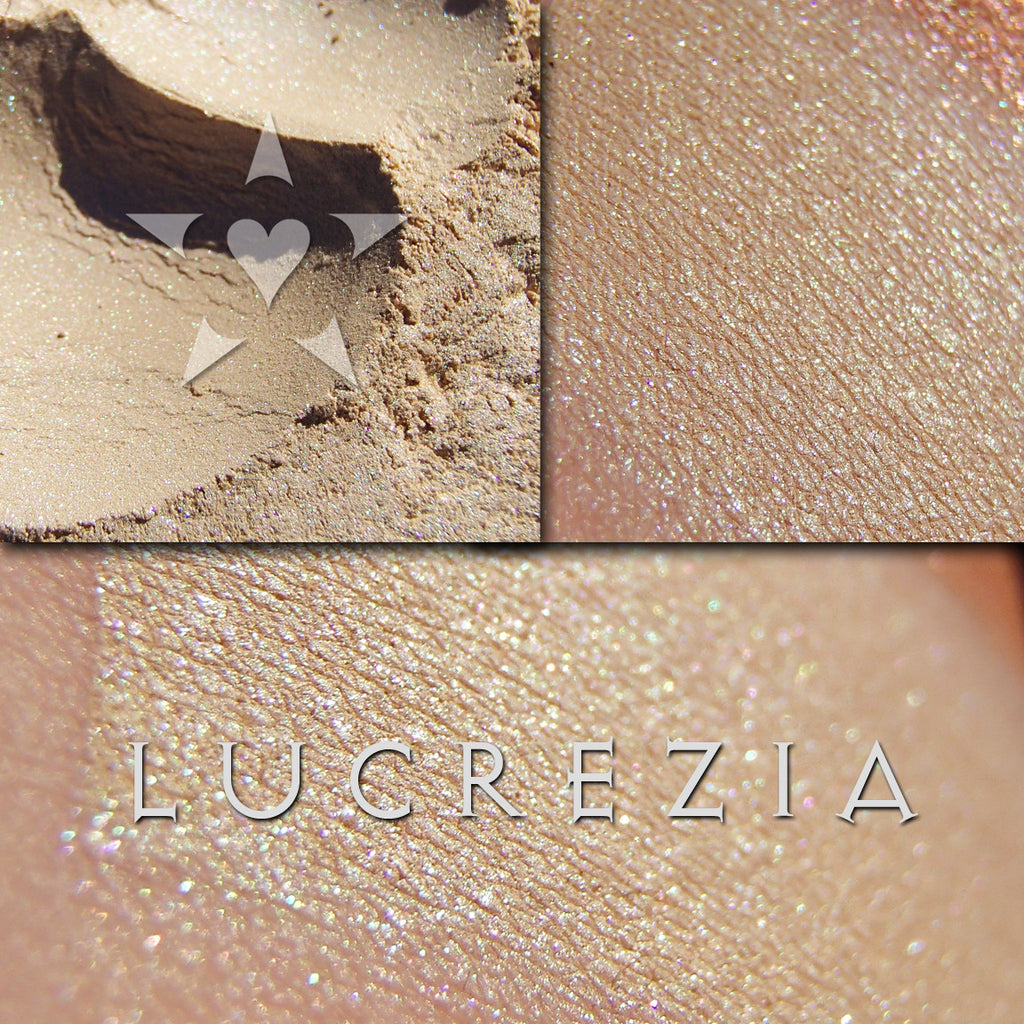 LUCREZIA eyeshadow shown loose and swatched on the skin. Lucrezia is a soft warm cream and soft tonal highlights of rose and green. Glowing/Lustre finish.