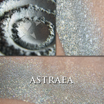 Collage showing Astraea loose and swatched on the skin. soft blue-grey toned highlight powder with a celestial gold shift and shimmer