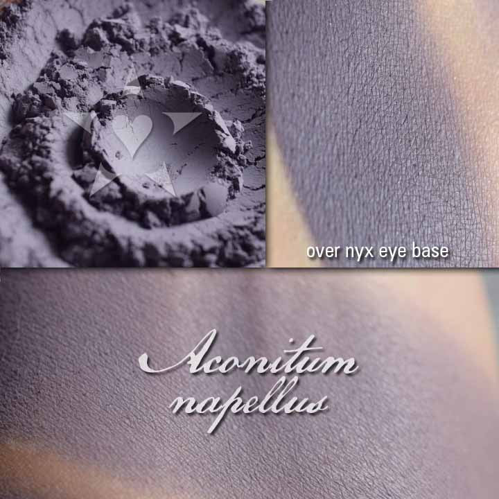 Image shows a greyed violet loose powder in three views,  loose in jar, lightly applied to skin, and heavier application over NYX eye base.