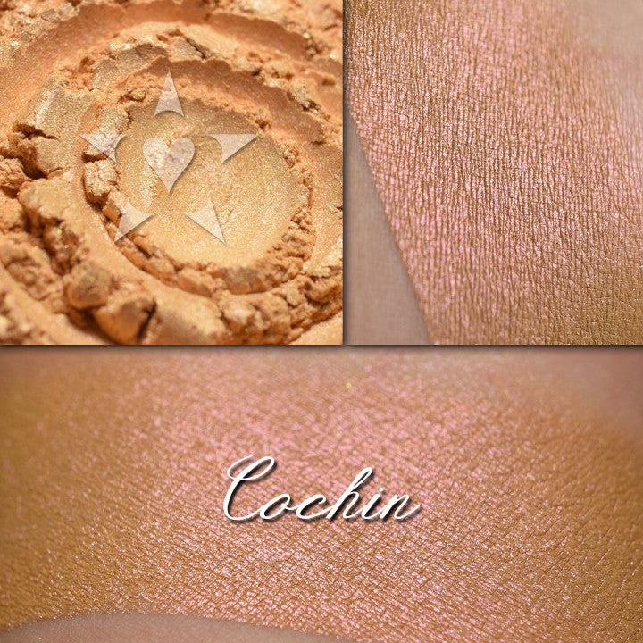 COCHIN - EYESHADOW loose and swatched on the skin.  A warm golden yellow/orange with a reddish pink shift.