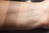 Cerura swatched on medium tone caucasian skin. Shown over primer and on bare skin. A muted tauped brown.