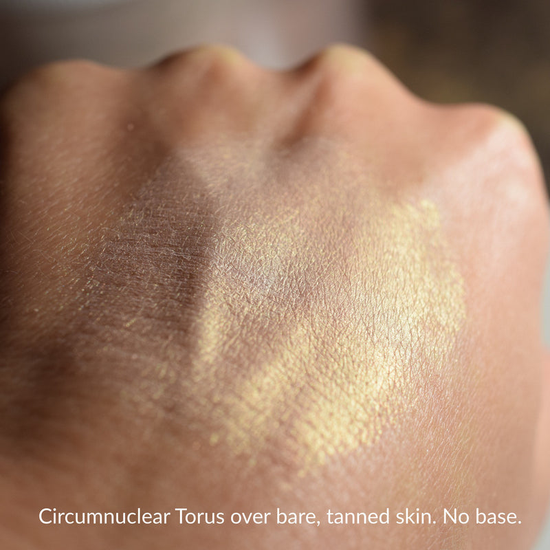 CIRCUMNUCLEAR TORUS  swatched over bare tanned skin, no base.