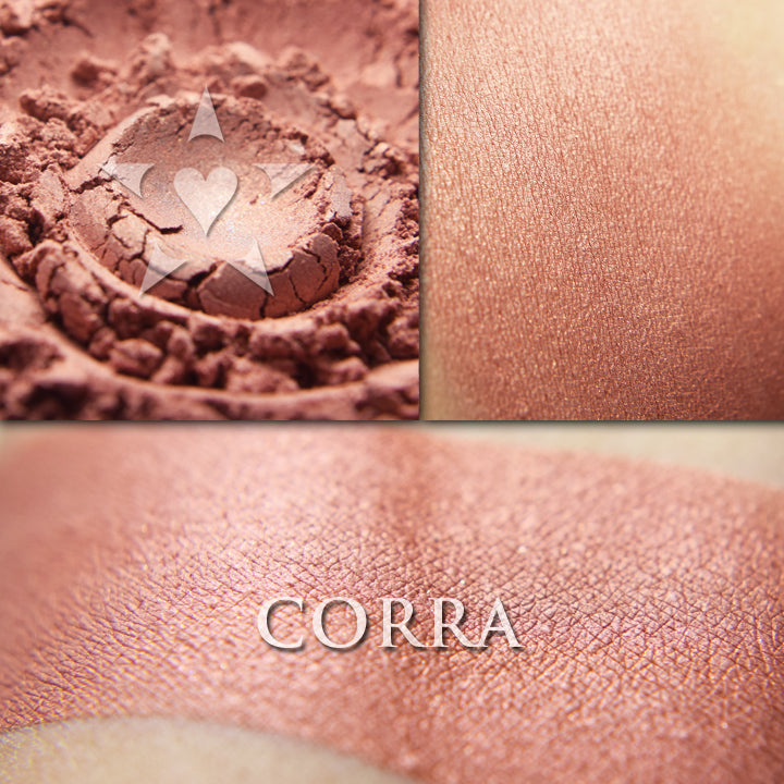 CORRA- Rouge loose and swatched on the skin. A a soft & warm pale terracotta with rose undertones and slight shimmer.