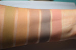 Matte eyeshadows swatched on medium tone caucasian skin. Lofn is on the far right.