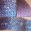 DEPTHS OF EREBUS - EYESHADOW loose and swatched on the skin. a deep blue base with a color shift that can range from aqua to blue to even a vivid warm purple at certain angles and lighting conditions.