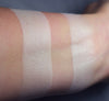 Diaphora swatched on medium tone caucasian skin, over primer and bare skin. A satin finish white.