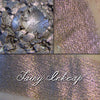 Fairy Inkcap eyeshadow, a greyed brown base with copper to red shift.