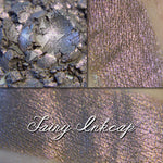 Fairy Inkcap eyeshadow, a greyed brown base with copper to red shift.
