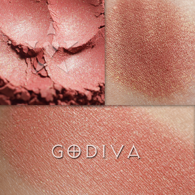 GODIVA rouge loose and swatched on the skin. 