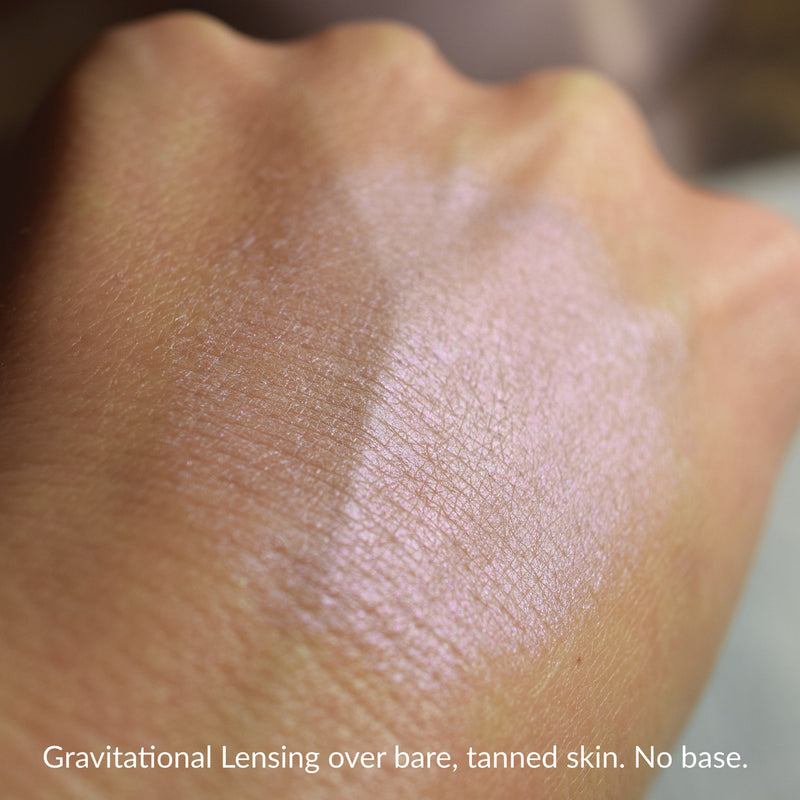 GRAVITATIONAL LENSING -over bare tanned skin, no base.