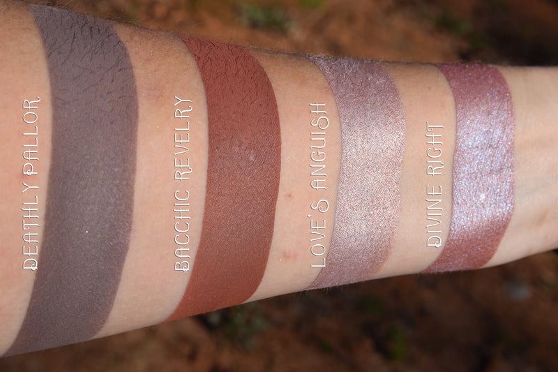 Swatches of contour powders and highlghters swatched on medium tone caucasian skin.