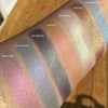 Glowy eyeshadows swatched on medium tone caucasian skin.