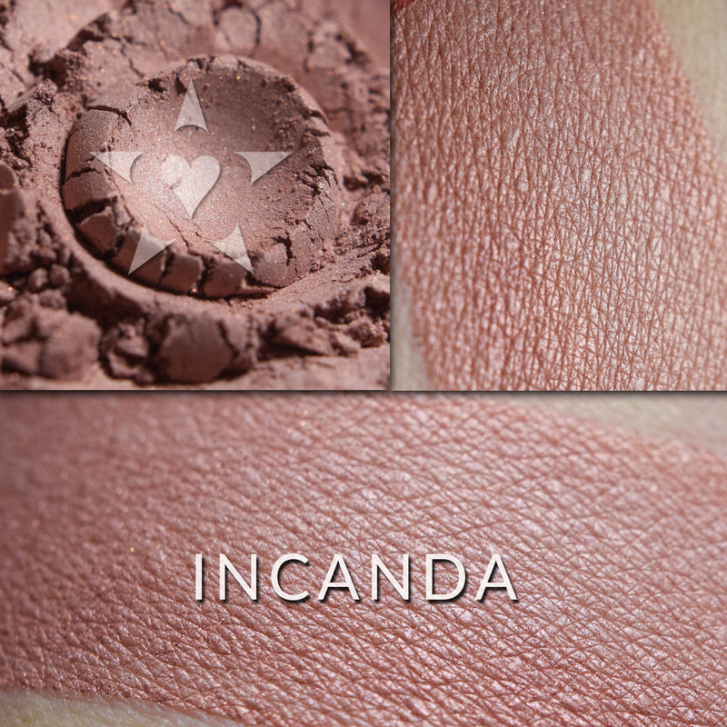 INCANDA - Multipurpose Illuminator loose and swatched on the skin. INCANDA - Delicate pinkish buff with a soft pink highlight.