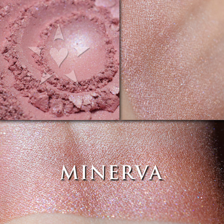 MINERVA rouge loose and swatched on the skin. MINERVA, a very wearable soft pink with peach tones, and blue and copper shimmer.