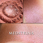 Meditrina loose and swatched on the skin. Meditrina is a warm-toned muted terracotta with a cooler violet iridescence