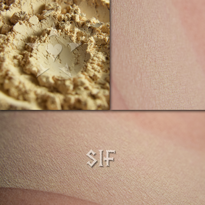 Sif matte eyeshadow shown loose and swatched on the skin. A pale cream matte