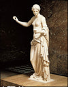 Marble statue of Phryne wearing greek style robes.
