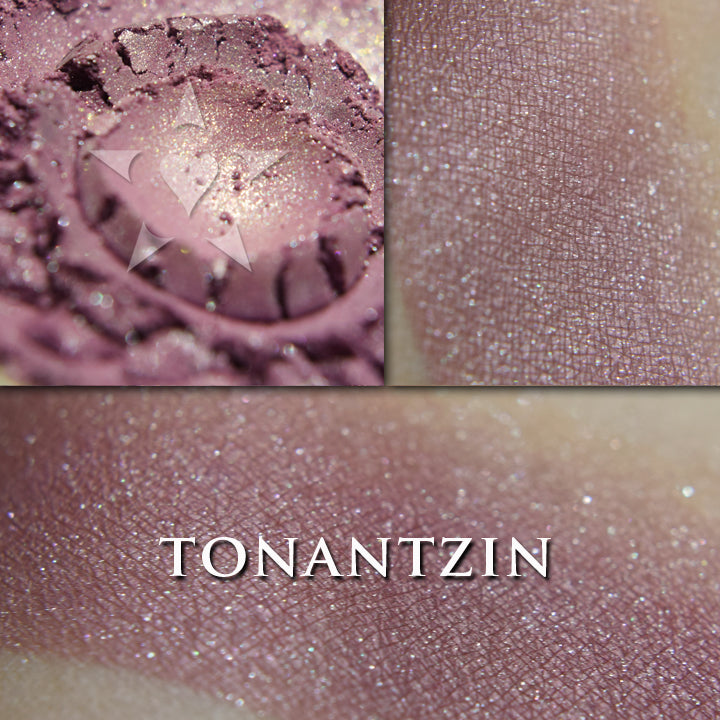 TONANTZIN - Rouge  loose and swatched on the skin. Tonantzin applies as a mauvey mid-tone luster, with silver shimmer.
