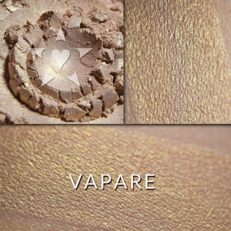 Vapare illuminator loose and swatched on the skin. VAPARE: A delicate champagne, very pale bronze.