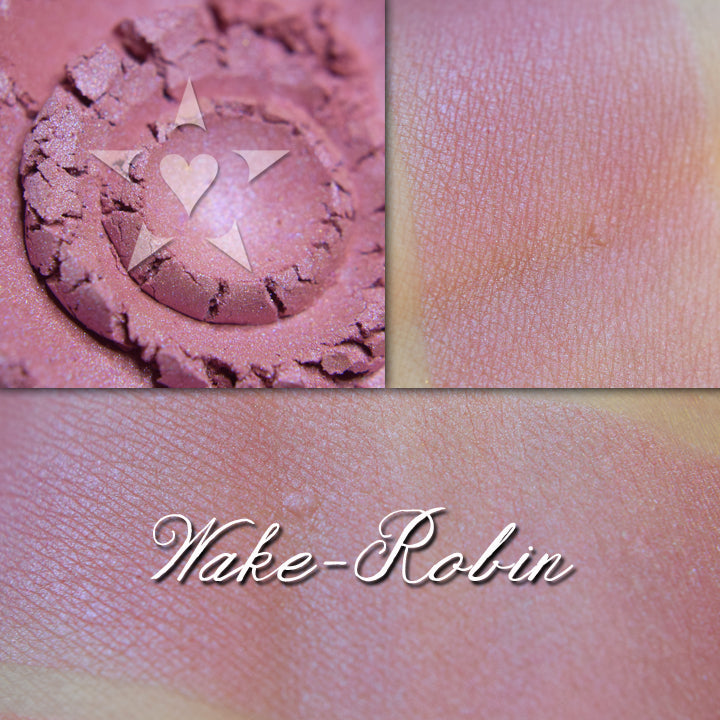 Wake Robin blush loose and swatched on the skin.  A soft cool pink with cool-toned blue/violet iridescence.