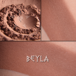 Beyla matte eyeshadow shown in collage. Loose and swatched on the skin. Midtone warm cocoa matte