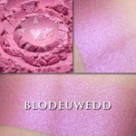 BLODEUWEDD- Rouge  loose and swatched on the skin.