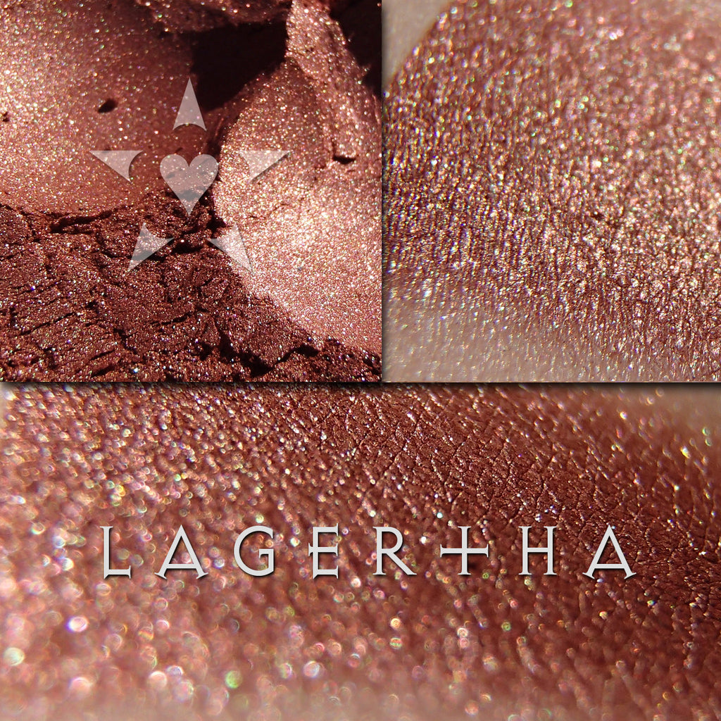 LAGERTHA eyeshadow shown loose and swatched on the skin. Lagertha, a deep, smooth copper with a very intense chrome effect of chartreuse, green and gold