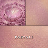 Parvati rouge loose and swatched on the skin. PARVATI is a cool rose tone with a golden glow.