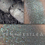PENTHESILEA eyeshadow shown loose and swatched on the skin. Penthesilea is a rich dark greenish patina with multichrome effects of violet-red and gold-chartreuse.