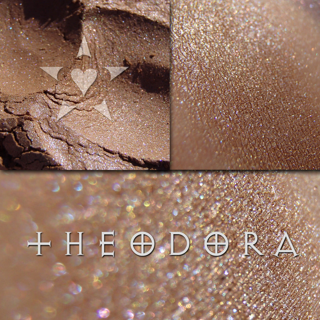 THEODORA eyeshadow loose and swatched on the skin. Theodora color shifts (over the warm cocoa base) to violet then to chartreuse with a point in between where you see shimmers of blue and aqua.
