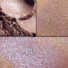 TOMYRIS eyeshadow loose and swatched on the skin. Tomyris is a lilac-y taupe, sometimes buff.